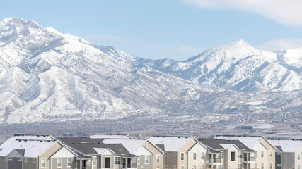 Panorama frame Neighborhood in South Jordan City 2Utah overlooking Wasatch Mountains in winter