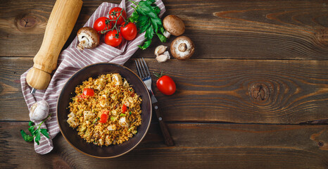 Couscous with turkey, tomatoes, champignon mushrooms and avocado.