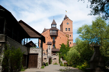 Obraz premium Radomysl Castle, Radomyshl. Ukraine. econstructed fortress in Radomyshl. The ancient castle in the city of Radomyshl. Ukraine. Amazing and beautiful castle Radomysl. Old lock. Landscape in the park