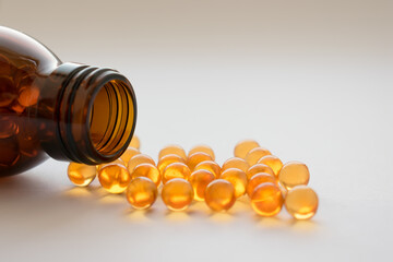 Omega 3 capsules with fish oil and bottle