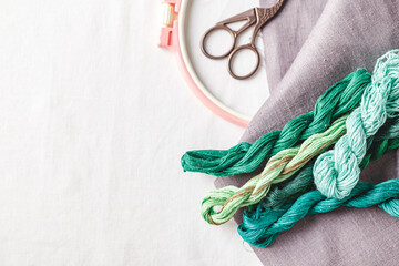 Embroidery set. Linen fabric, embroidery patterns, embroidery hoop, colorful threads and needls.