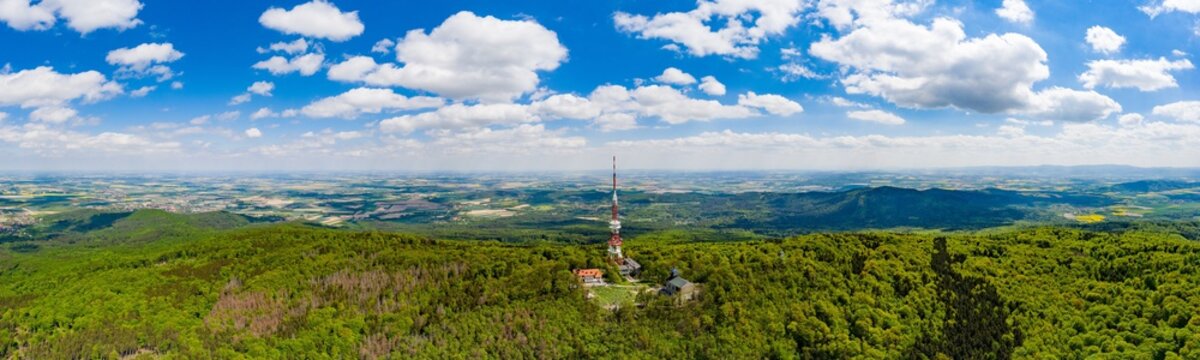 Aerial drone view on Sleza mountain with tv tower on top.
