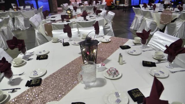 Modern Wedding Restaurant Table Settings For Eight, With Lattern in the MIddle, Parallax Shot