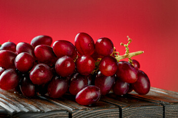Close-up of red grapes. Side view
