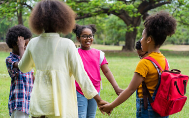 Cheerful of diverse children playing outdoor concept, Kids playing game with friendship, Field...