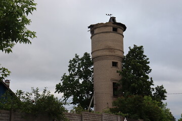 brick water tower building in village