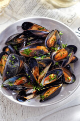 Mussels with garlic in white wine with parsley