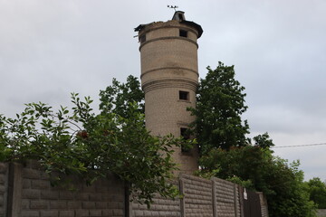 brick water tower building in village