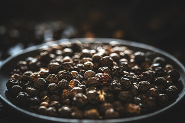 Pile of black peppercorns