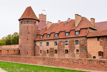 Fototapeta na wymiar Sightseeing of Poland. Medieval castle in Malbork town, a popular architectural and tourist attraction in Poland