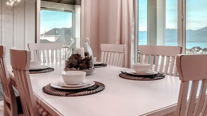 Panorama Dining room with mountain lake neighborhood and porch view through the windows