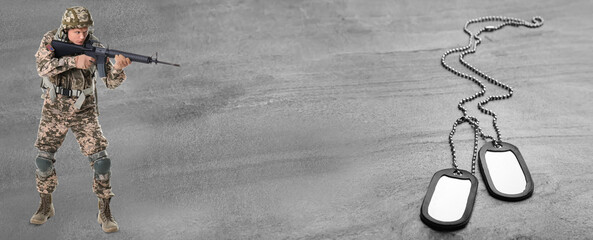 Male soldier with machine gun and military ID tags on color background, banner design. Space for...