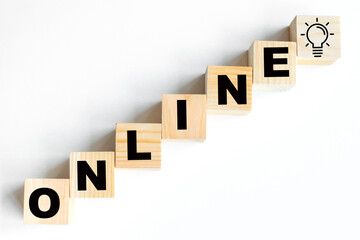 Obraz premium Online-an inscription made of wooden cubes on a white background . Online sale.