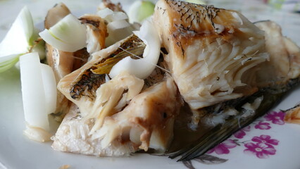 on the plate is a boiled fish pike