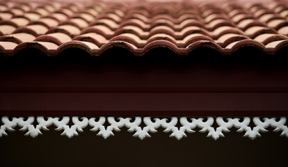 Tile roof with white carving decor