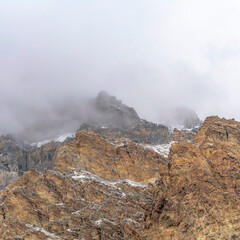 Square Misty clouds over the rugged and rocky slope of Provo Canyon mountain in Utah