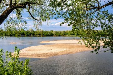 Panoramic view of Vistula river waters with sandy islands and shores of Lawice Kielpinskie natural reserve near Lomianki town north of Warsaw in central Mazovia region of Poland