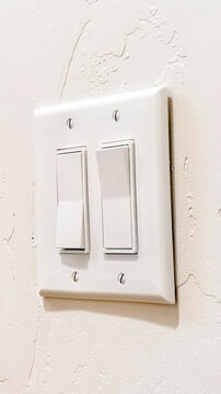 Vertical Wall mounted electrical rocker light switch with multiple flat broad levers