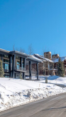 Vertical Road and homes on a luxury neighborhood in snowy Park City Utah in winter