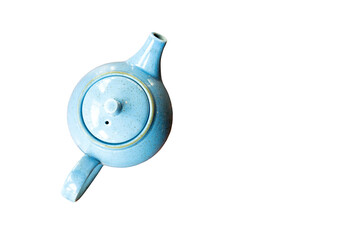 Light blue speckled retro teapot from above