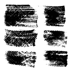 Abstract textured black strokes on rough paper isolated on a white background