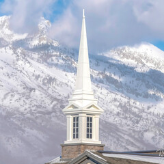 Square Magnificent view of snow covered Wasatch Mountain with church in the foreground