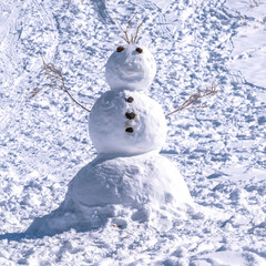 Square Snowman on a snow covered mountain in Park City Utah winter wonderland