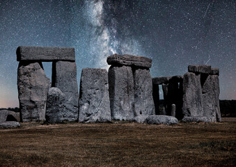 Stonehenge beneath the Milky Way in silvery blue light