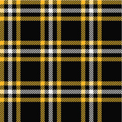 Plaid (tartan) seamless pattern. Black, yellow and white color.