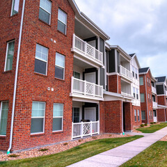 Square crop Modern housing complex with apartments day light