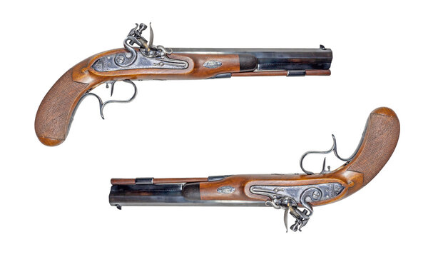 Muzzleloading blackpowder guns on white background. There are a "Manton".