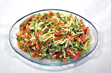 Tomatoes, cucumbers, red peppers, greens . chicken salad.