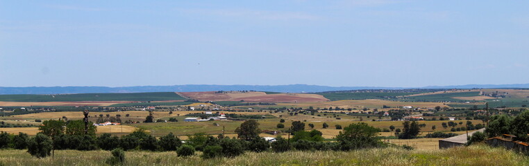 Fototapeta na wymiar Panoramic view from the hill on which the town of Beja is located, view of agricultural fields.