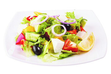 Green vegan salad from green leaves mix and vegetables