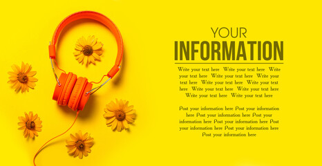 Orange headphones, flowers on orange yellow background. Music concept., copy space