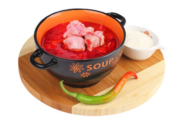 Kharcho soup with meat and rice on the wood plate