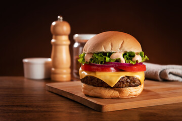 Fast food restaurant hamburger on cutting board