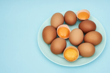 Chicken eggs on a saucer, a plate. Food, protein in foods.