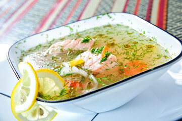 Red fish soup. Red fish soup with spices and lemon.