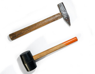 Two hammers. Rubber and steel hammers isolated on a white background.