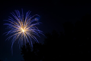 Blue fireworks at night sky