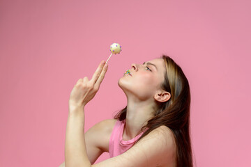 young european woman playes cake pops