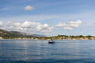 Fototapeta na wymiar View of sea and island with boat