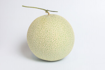 Green melon on the white background.
