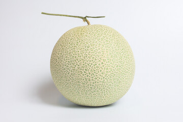 Green melon on the white background.
