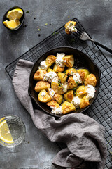 Baked potato with mozarella cheese 
