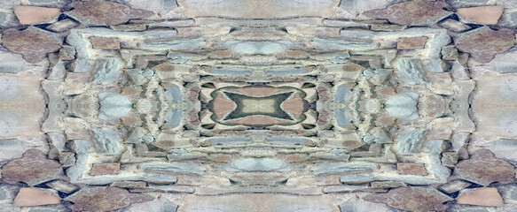 An image of a grungy weathered limestone rubble wall surface.