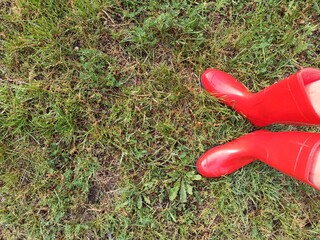 red boots on grass