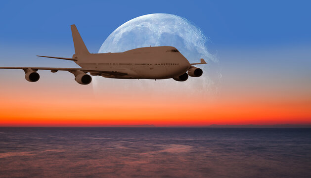 Passenger airplane in the sky with full moon "Elements of this image furnished by NASA "
