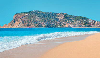 Obraz premium Ancient shipyard near of Red tower ( Kizil Kule) in Alanya peninsula with amazing beach - Antalya, Turkey